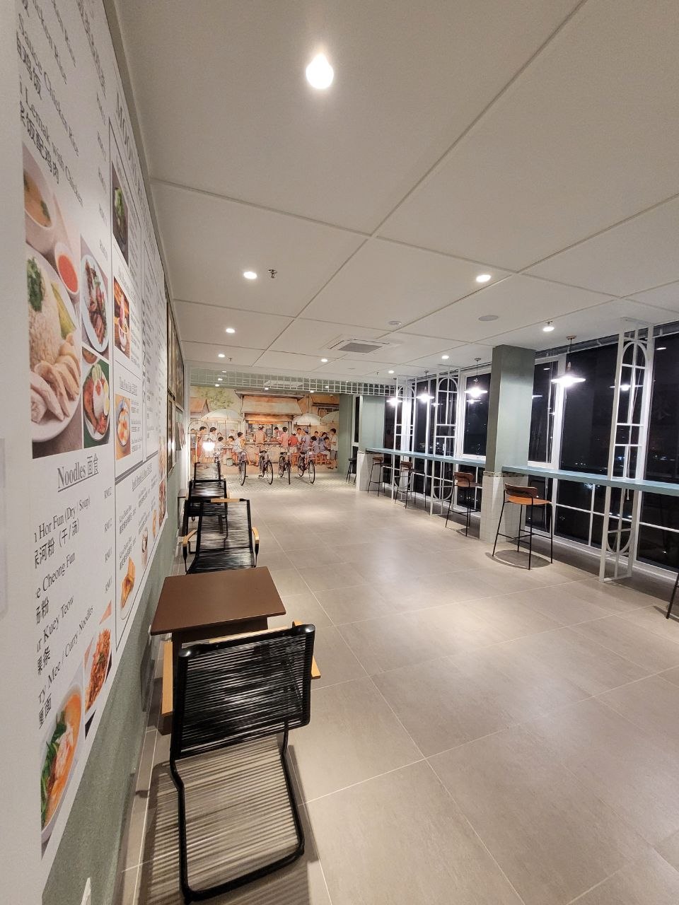 Cha chaan teng-inspired dining and co-working area with a food mural